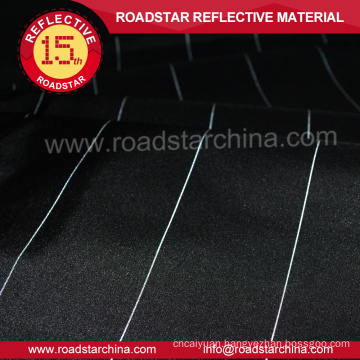 upmarket black polyester fabric with reflective thread